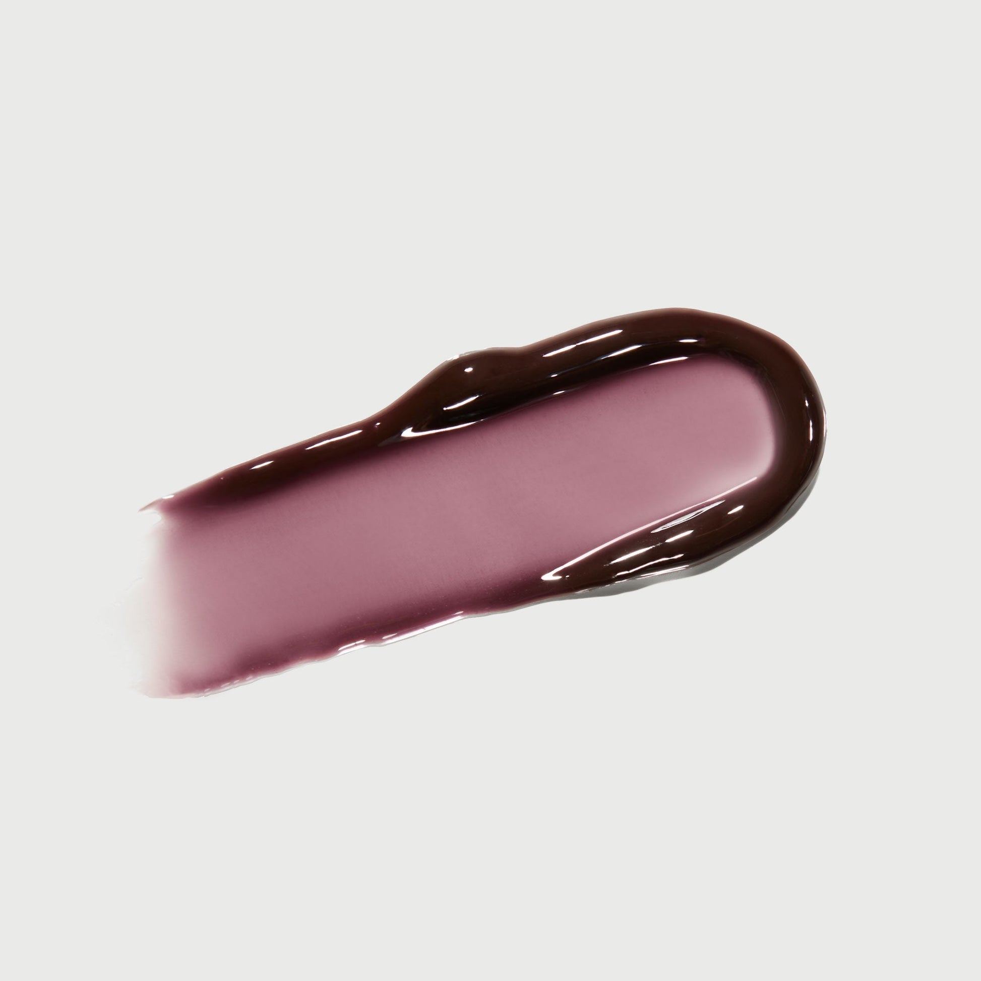 phyto-glow-lip-balm-midnight-j7 NATR-10118-Swatch-Phyto-Glow-Midnight-bonebkgd.jpg