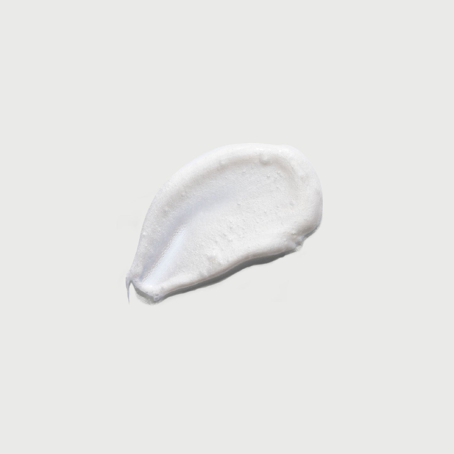 the-smoother-glycolic-acid-exfoliating-body-wash-e1 NATR-40002-Swatch-The-Smoother-Glycolic-Acid-Exfoliating-Body-Wash-bonebkgd.jpg