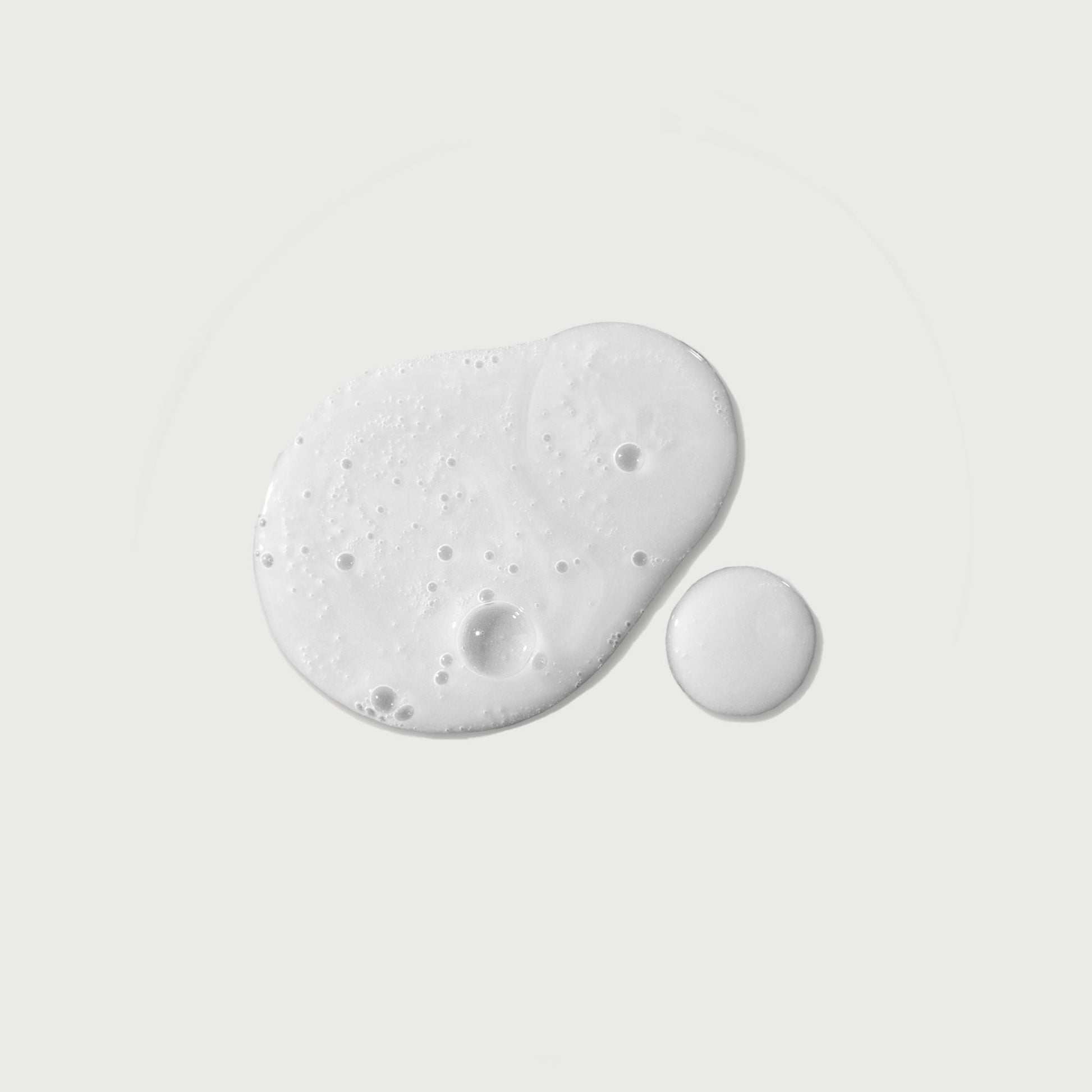 the-purifier-niacinamide-serum-body-wash-n5 NATR-40012-Swatch-The-Purifier-Niacinamide-Serum-Body-Wash-bonebkgd.jpg